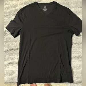 Black v-neck H&M short sleeve shirt. Slim fit medium